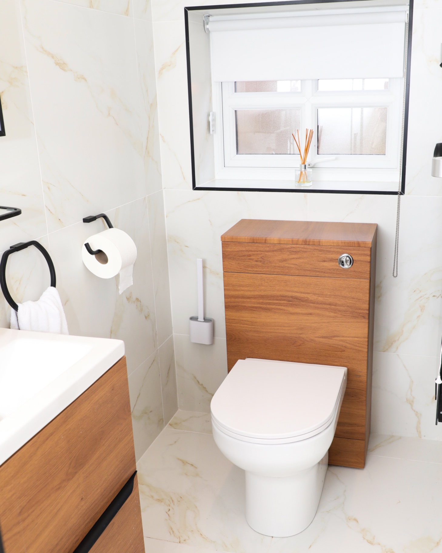 Bright modern bathroom with wood-fronted cabinetry